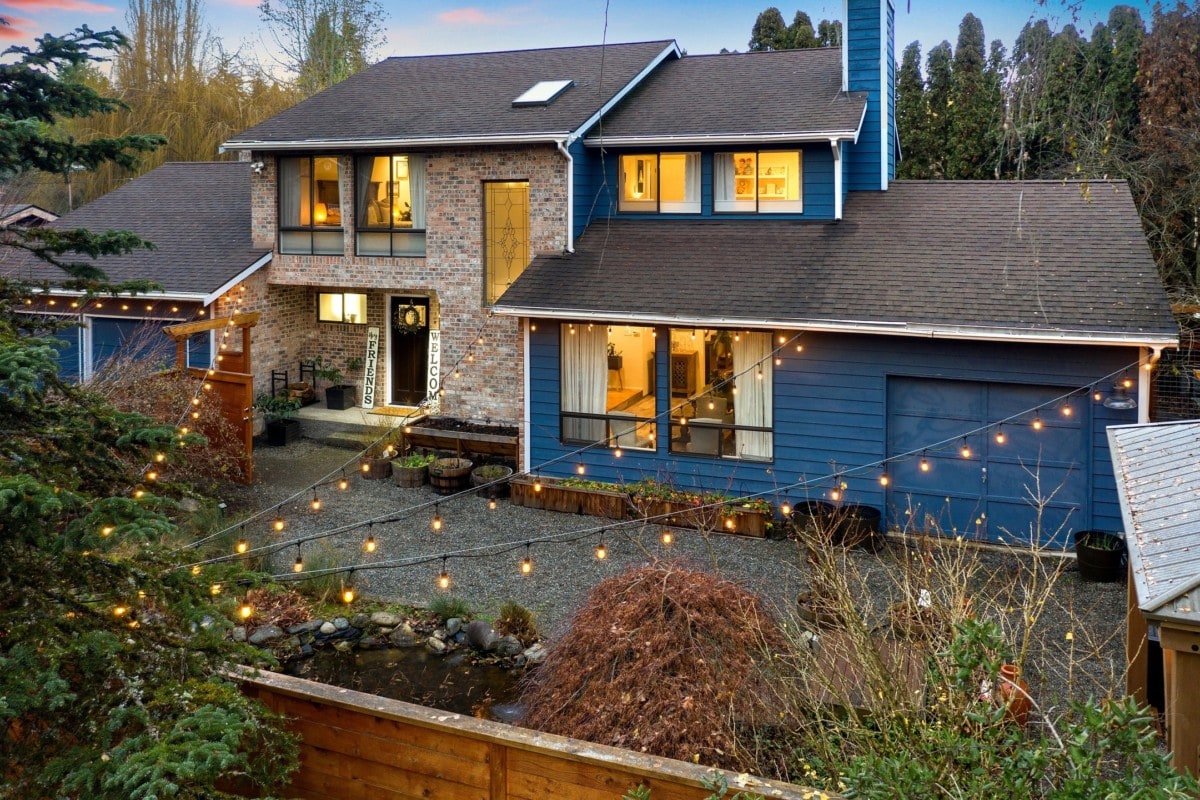 blue-and-stone-home-with-lights